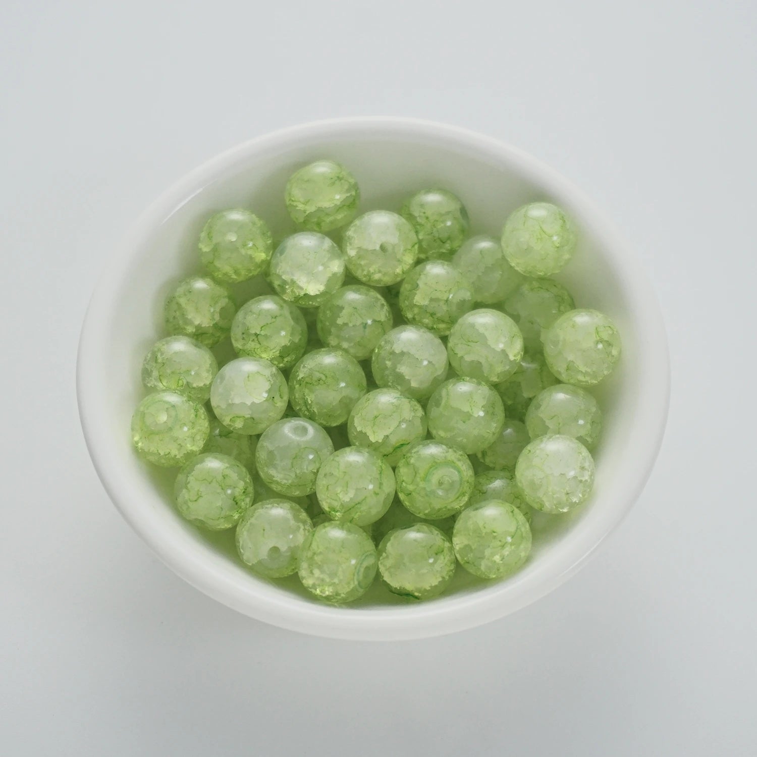 BD00009-01-cyan-green-crack-round-glass-beads-10mm