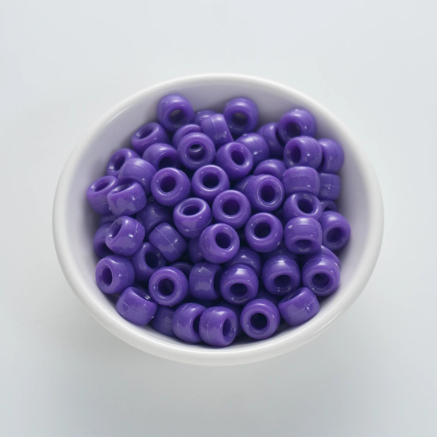 BD00037-01-indigo-purple-barrel-opaque-pony-beads-6×9mm