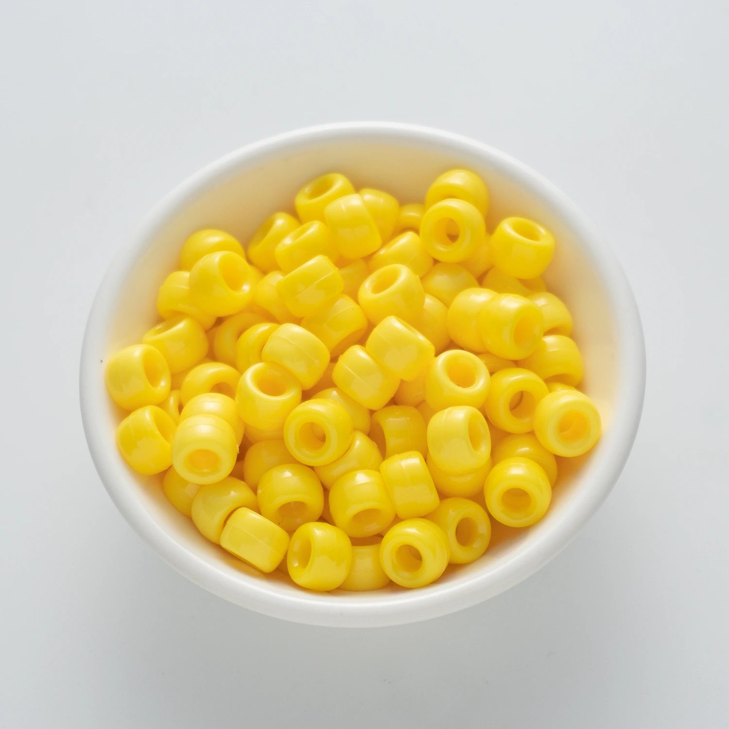 BD00039-01-corn-yellow-barrel-opaque-pony-beads-6×9mm