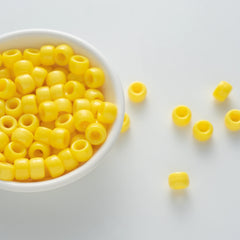 BD00039-04-corn-yellow-barrel-opaque-pony-beads-6×9mm