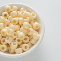 BD00040-03-cream-yellow-barrel-opaque-pony-beads-6×9mm