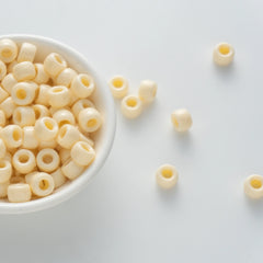 BD00040-04-cream-yellow-barrel-opaque-pony-beads-6×9mm