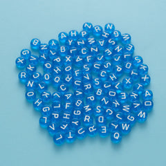 BD00041-03-white-letter-dark-blue-transparent-coin-alphabet-beads-mix-4×7mm