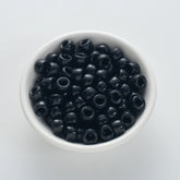 BD00048-01-pure-black-barrel-opaque-pony-beads-6×9mm
