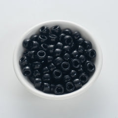 BD00048-01-pure-black-barrel-opaque-pony-beads-6×9mm