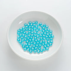 BD00059-01-white-letter-ice-blue-transparent-coin-alphabet-beads-mix-4×7mm