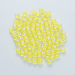 BD00063-02-white-letter-bright-yellow-transparent-coin-alphabet-beads-mix-4×7mm