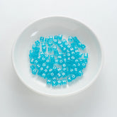 BD00074-01-white-letter-ice-blue-transparent-cube-alphabet-beads-mix-6mm