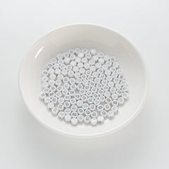 BD00085-01-silver-letter-white-opaque-coin-alphabet-beads-single-b-4×7mm