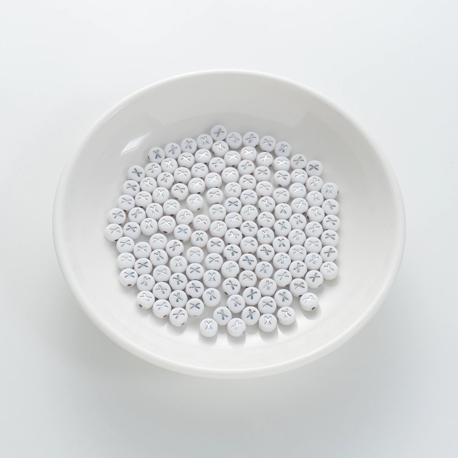 BD00107-01-silver-letter-white-opaque-coin-alphabet-beads-single-x-4×7mm