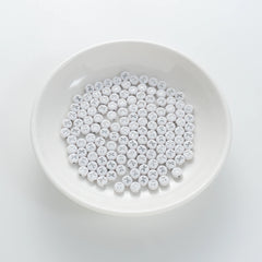 BD00107-01-silver-letter-white-opaque-coin-alphabet-beads-single-x-4×7mm