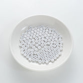 BD00108-01-silver-letter-white-opaque-coin-alphabet-beads-single-y-4×7mm