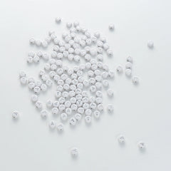 BD00108-03-silver-letter-white-opaque-coin-alphabet-beads-single-y-4×7mm