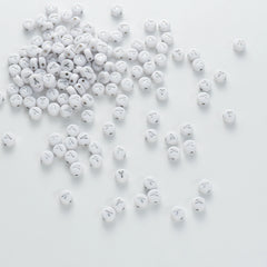 BD00108-04-silver-letter-white-opaque-coin-alphabet-beads-single-y-4×7mm