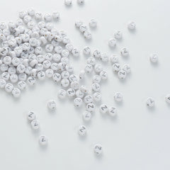 BD00109-04-silver-letter-white-opaque-coin-alphabet-beads-single-z-4×7mm