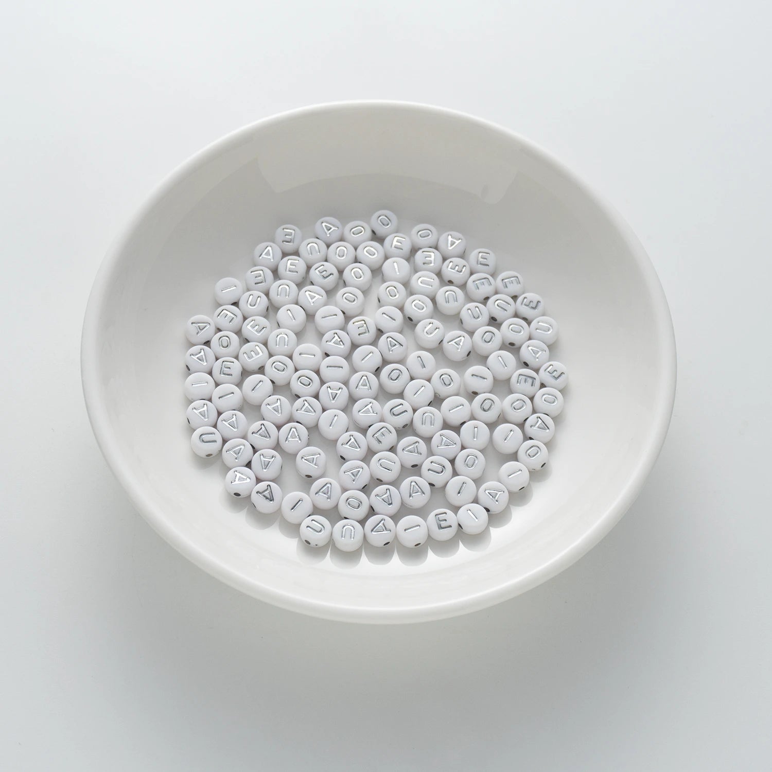 BD00110-01-silver-letter-white-opaque-coin-vowel-alphabet-beads-mix-4×7mm