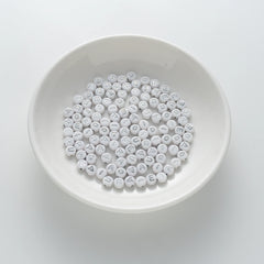 BD00110-01-silver-letter-white-opaque-coin-vowel-alphabet-beads-mix-4×7mm