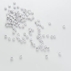 BD00111-04-silver-letter-white-opaque-coin-alphabet-beads-mix-4×7mm