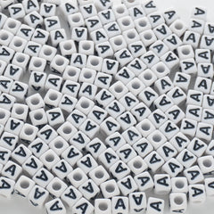 BD00112-02-black-letter-white-opaque-cube-alphabet-beads-single-a-7mm
