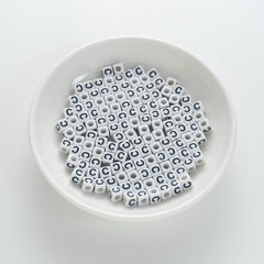 BD00114-01-black-letter-white-opaque-cube-alphabet-beads-single-c-7mm