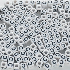 BD00114-02-black-letter-white-opaque-cube-alphabet-beads-single-c-7mm