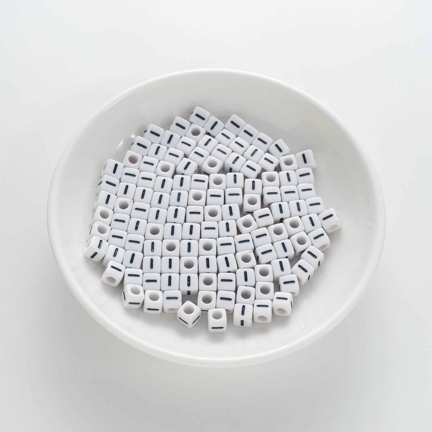 BD00120-01-black-letter-white-opaque-cube-alphabet-beads-single-i-7mm