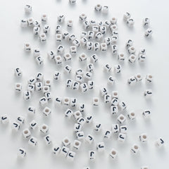 BD00121-03-black-letter-white-opaque-cube-alphabet-beads-single-j-7mm
