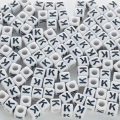 BD00122-02-black-letter-white-opaque-cube-alphabet-beads-single-k-7mm