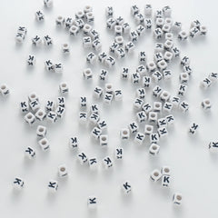 BD00122-03-black-letter-white-opaque-cube-alphabet-beads-single-k-7mm