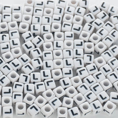 BD00123-02-black-letter-white-opaque-cube-alphabet-beads-single-l-7mm