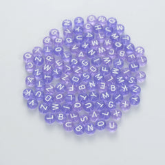 BW-00060-BD-02-white-letter-pastel-purple-transparent-coin-alphabet-beads-mix-4×7mm