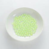 BW-00062-BD-01-white-letter-tea-green-transparent-coin-alphabet-beads-mix-4×7mm