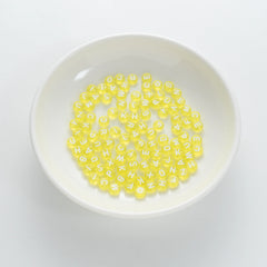 BW-00063-BD-01-white-letter-bright-yellow-transparent-coin-alphabet-beads-mix-4×7mm