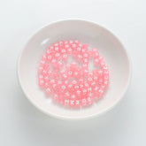 BW-00076-BD-01-white-letter-pastel-pink-transparent-cube-alphabet-beads-mix-6mm