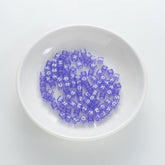 BW-00077-BD-01-white-letter-pastel-purple-transparent-cube-alphabet-beads-mix-6mm