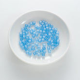 BW-00080-BD-01-white-letter-light-blue-transparent-cube-alphabet-beads-mix-6mm
