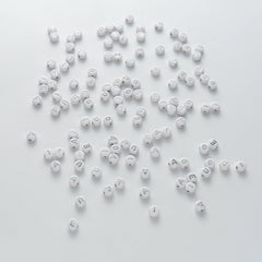 BW-00110-BD-03-silver-letter-white-opaque-coin-vowel-alphabet-beads-mix-4×7mm
