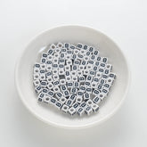 BW-00113-BD-01-black-letter-white-opaque-cube-alphabet-beads-single-b-7mm