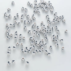 BW-00117-BD-03-black-letter-white-opaque-cube-alphabet-beads-single-f-7mm