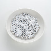 BW-00120-BD-01-black-letter-white-opaque-cube-alphabet-beads-single-i-7mm