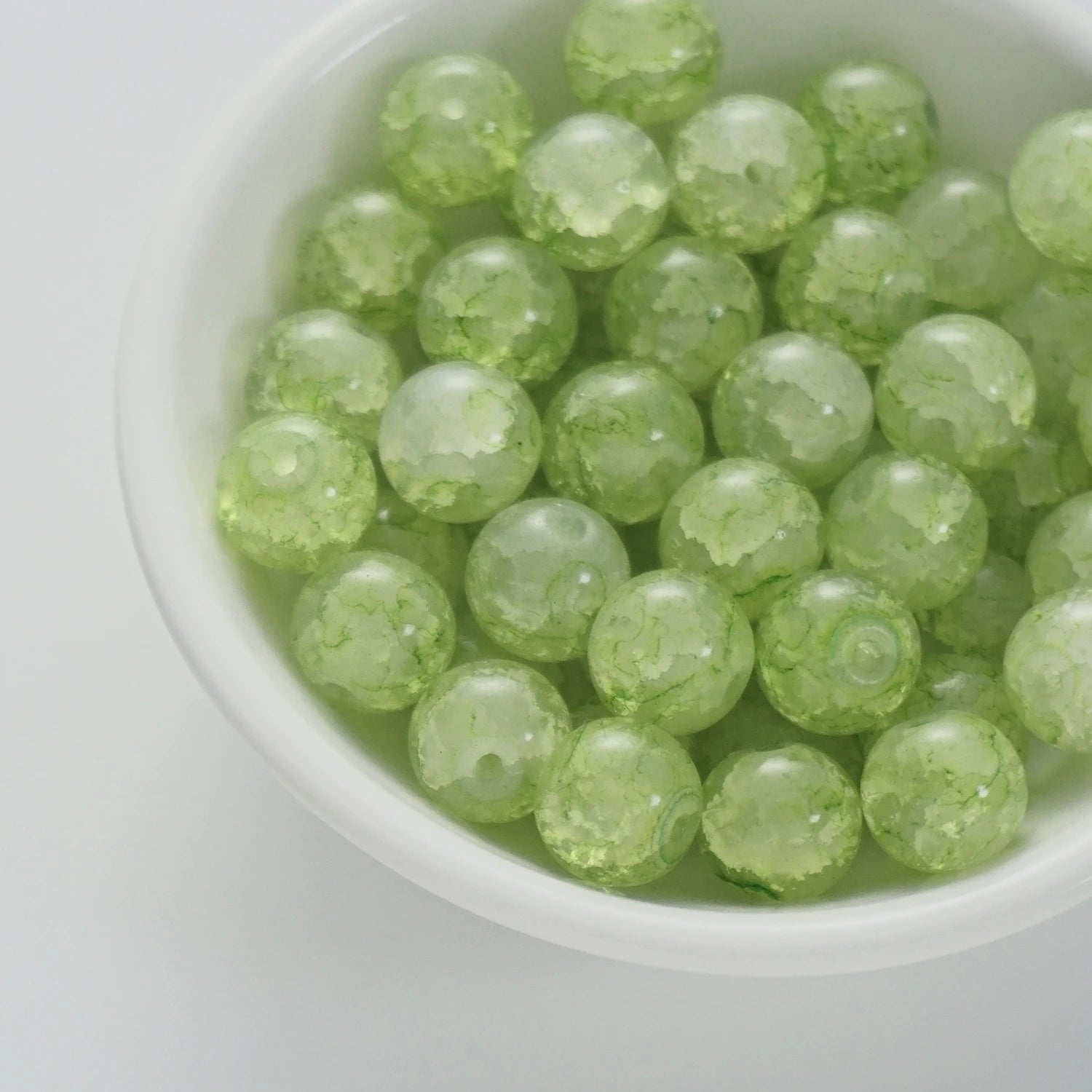 BD00009-02-cyan-green-crack-round-glass-beads-10mm