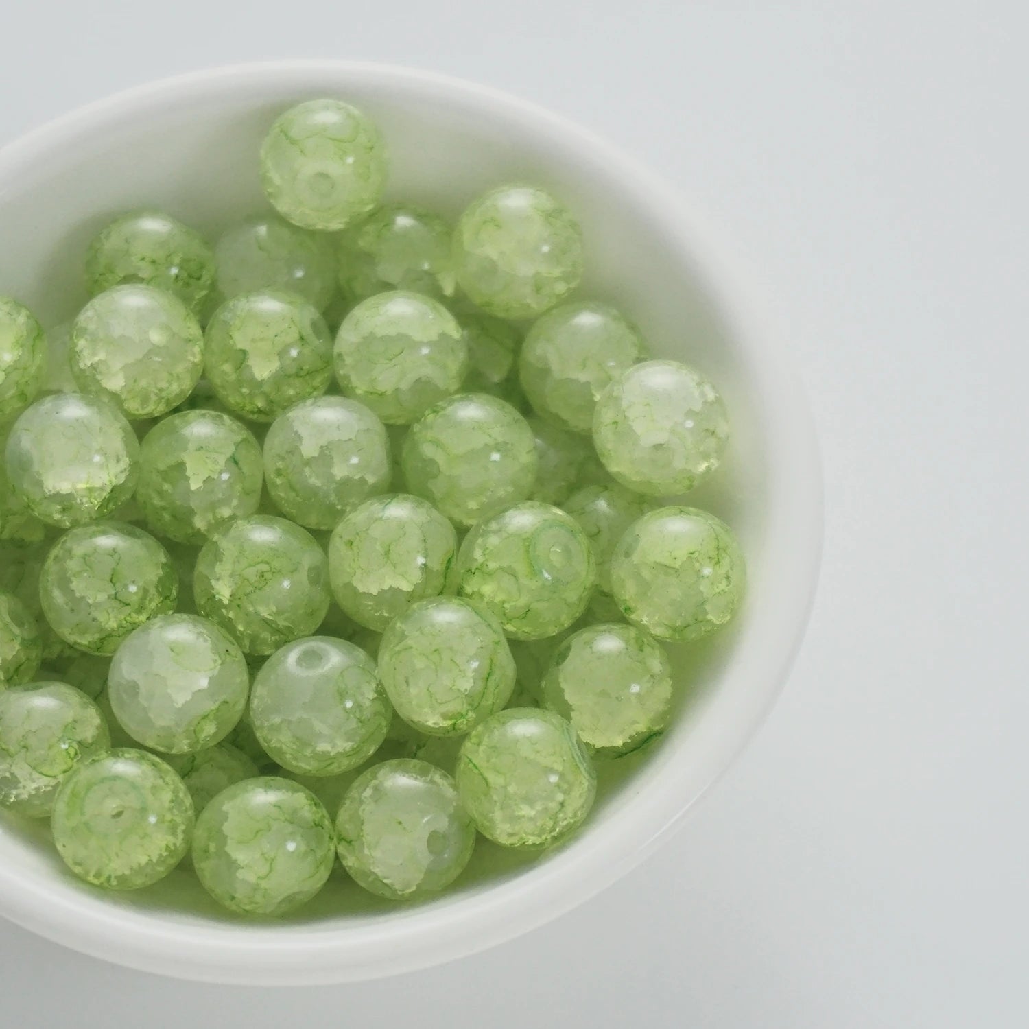 BD00009-03-cyan-green-crack-round-glass-beads-10mm