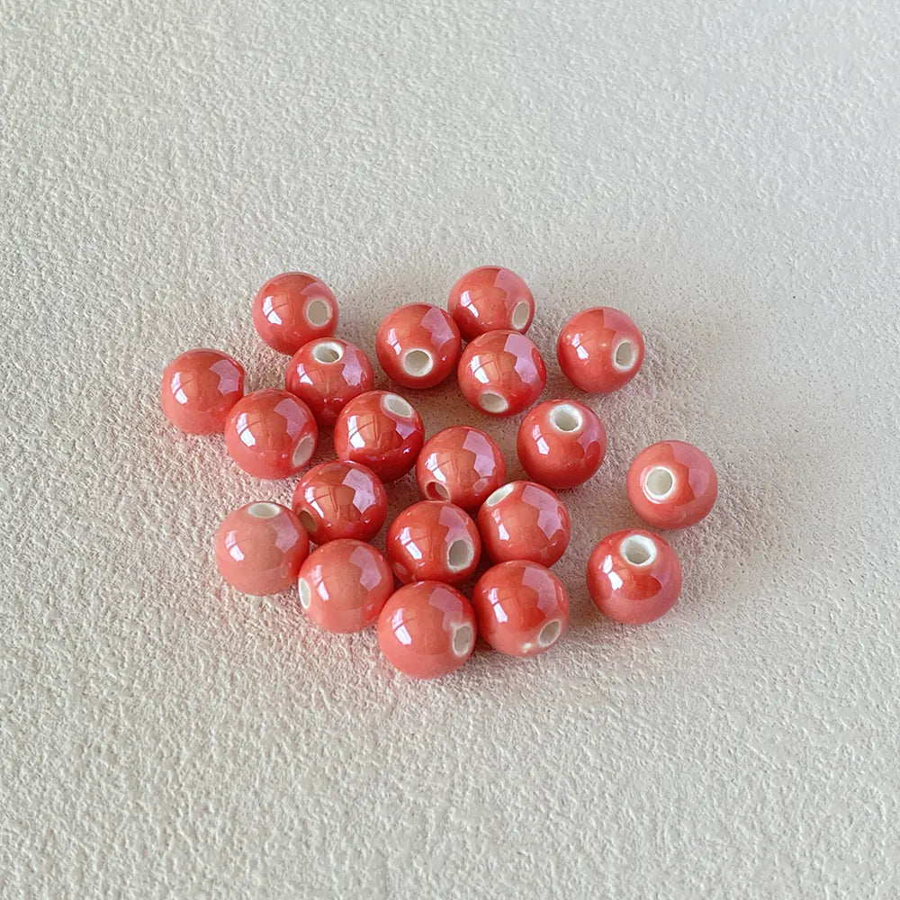 BD00014-01-creamy-blush-pink-round-ceramic-beads-10mm