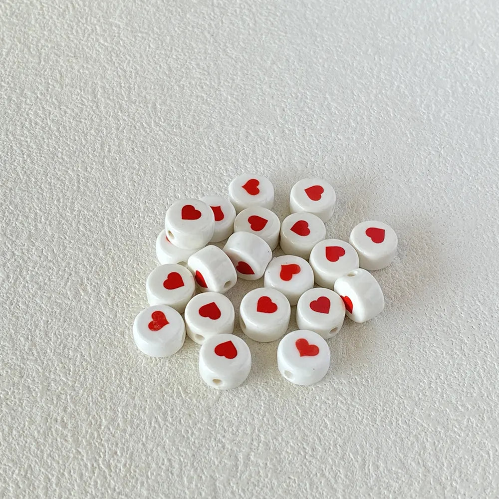 BD00017-01-red-heart-white-coin-ceramic-beads-6x10mm