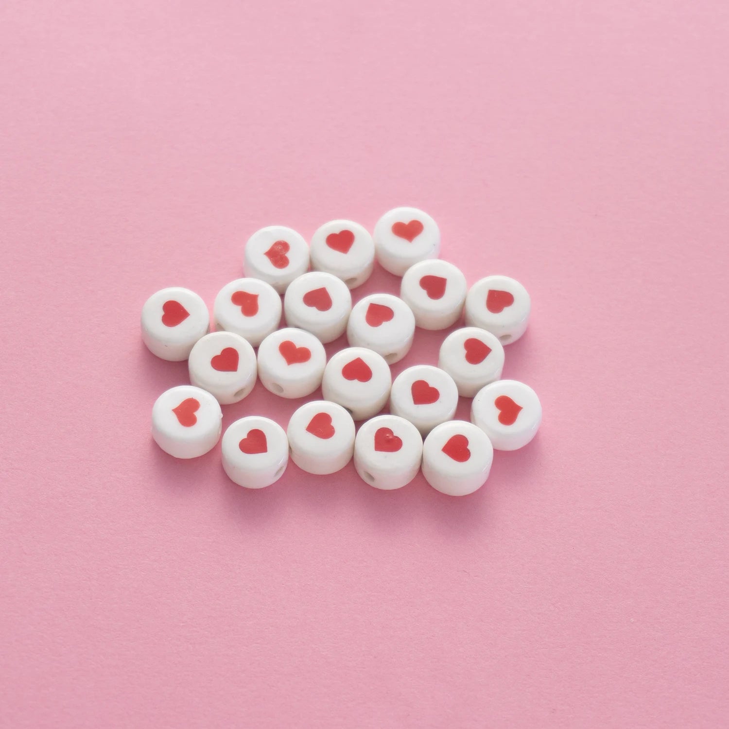 BD00017-05-red-heart-white-coin-ceramic-beads-6x10mm