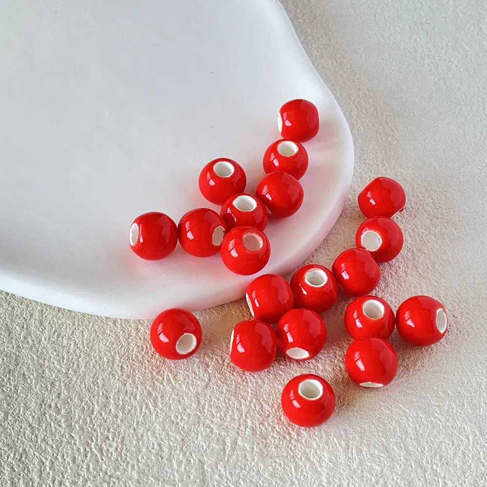 BD00019-02-red-large-hole-round-ceramic-beads-9x11mm