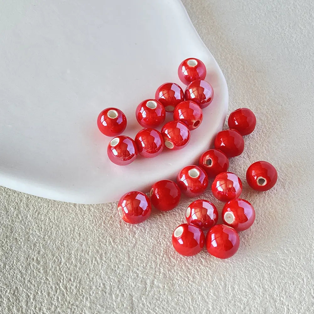 BD00021-02-red-round-ceramic-beads-10mm