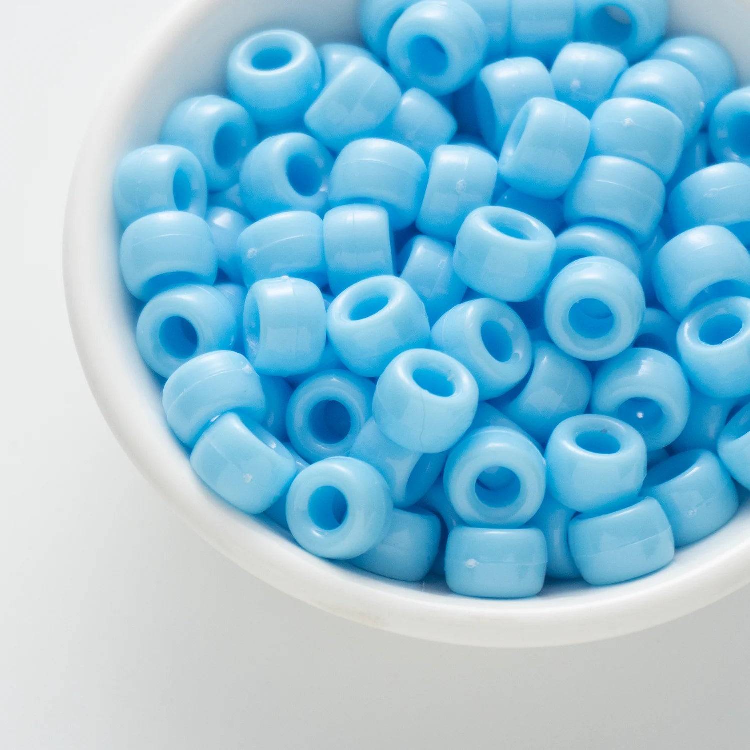 BD00035-02-sky-blue-barrel-opaque-pony-beads-6×9mm