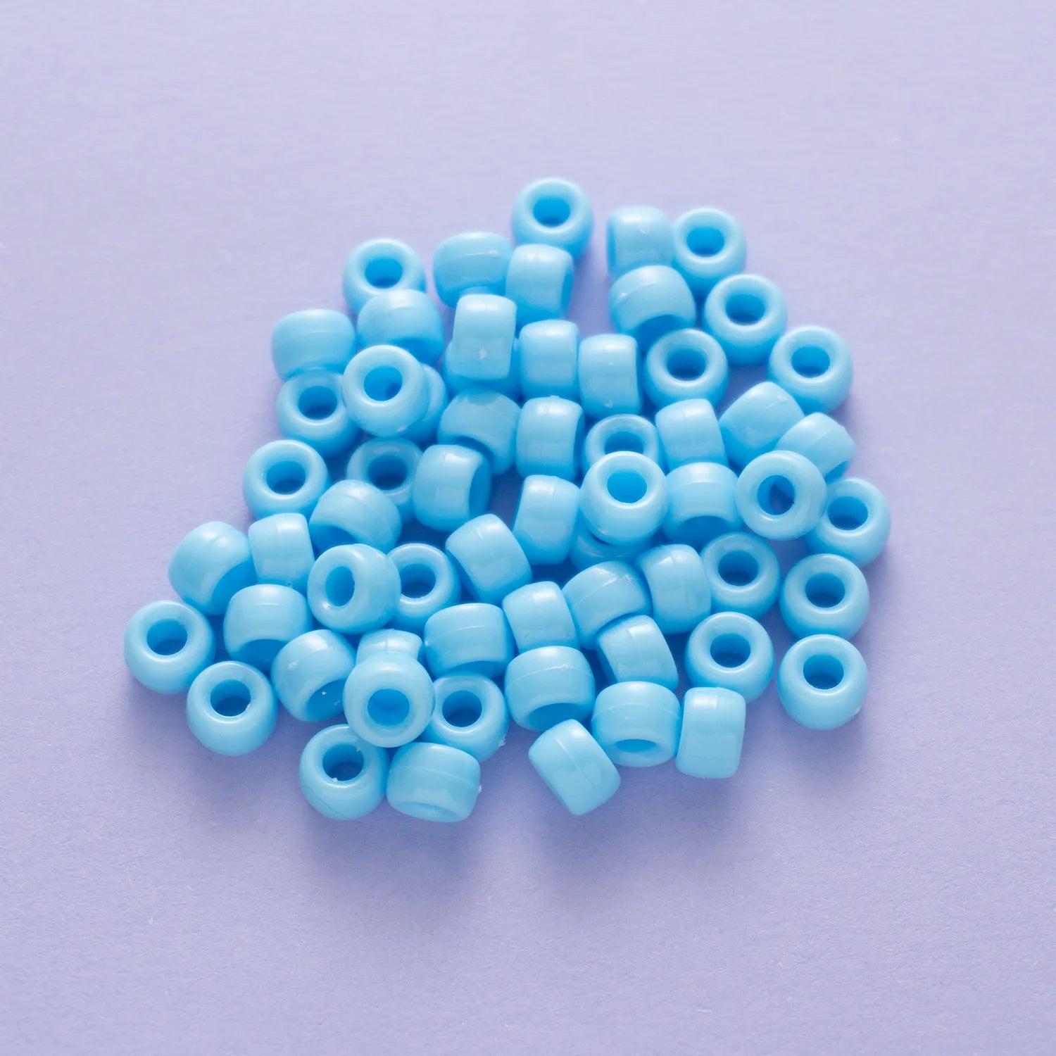 BD00035-05-sky-blue-barrel-opaque-pony-beads-6×9mm