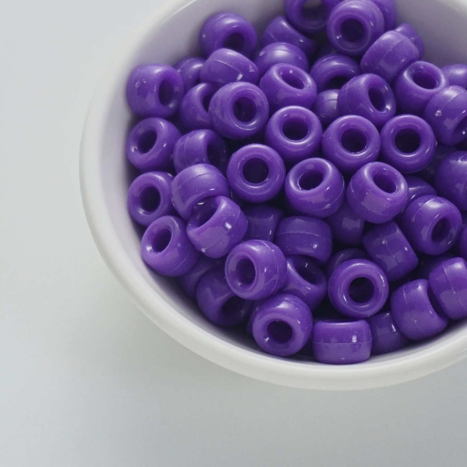 BD00037-02-indigo-purple-barrel-opaque-pony-beads-6×9mm